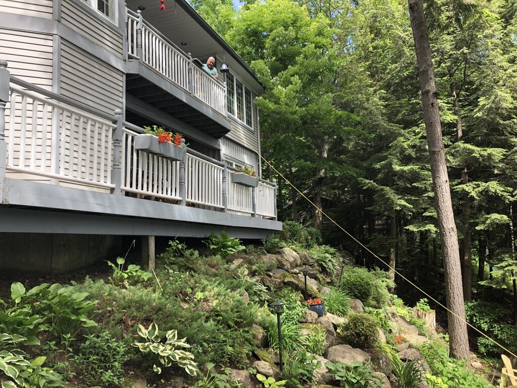 To the boathouse below.