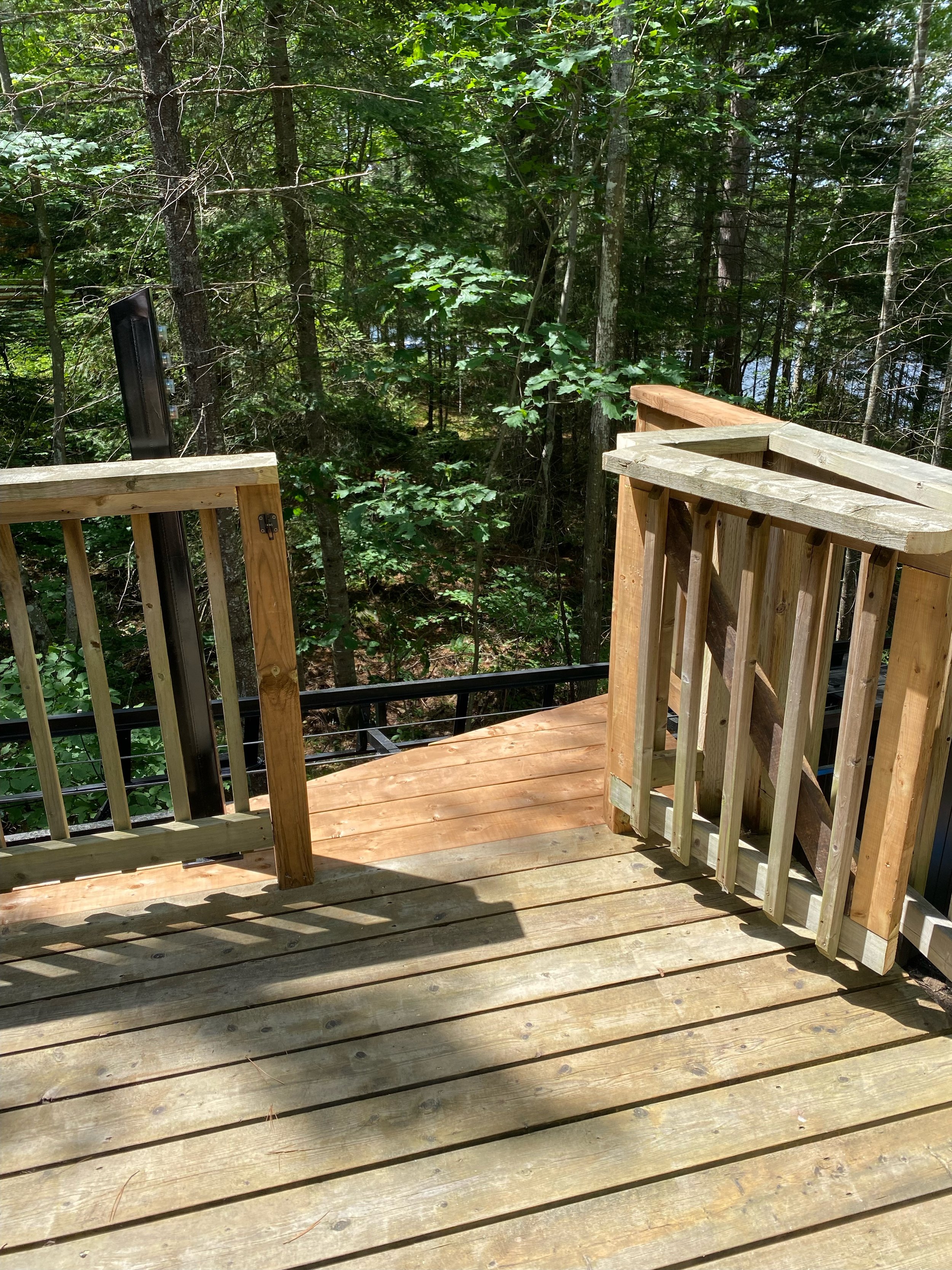 The upper station was built on an existing deck, which the client's contractor extended to accommodate the new lift. Now the cottage and waterfront can be enjoyed without navigating any stairs.