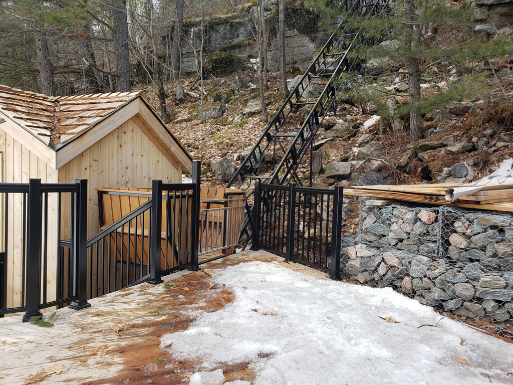 The lower station nearing completion, with a view up the track and the car in the curve.