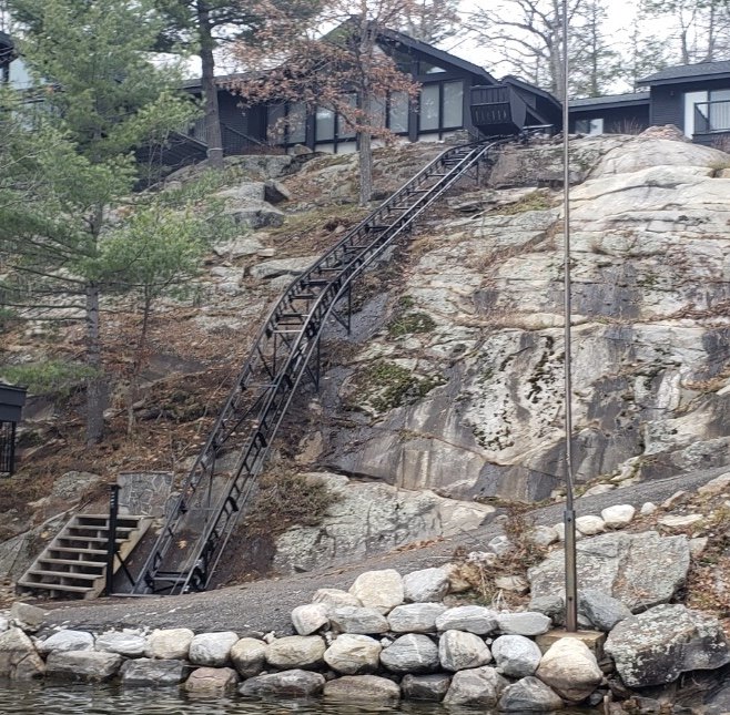 From the water, the lift offers a stunning view and blends seamlessly into the landscape. The three-pitch track design keeps it low to the ground and unobtrusive. This is our second three-pitch lift; the design is otherwise virtually identical to our two-pitch models, with the only difference being a second curved section of track.