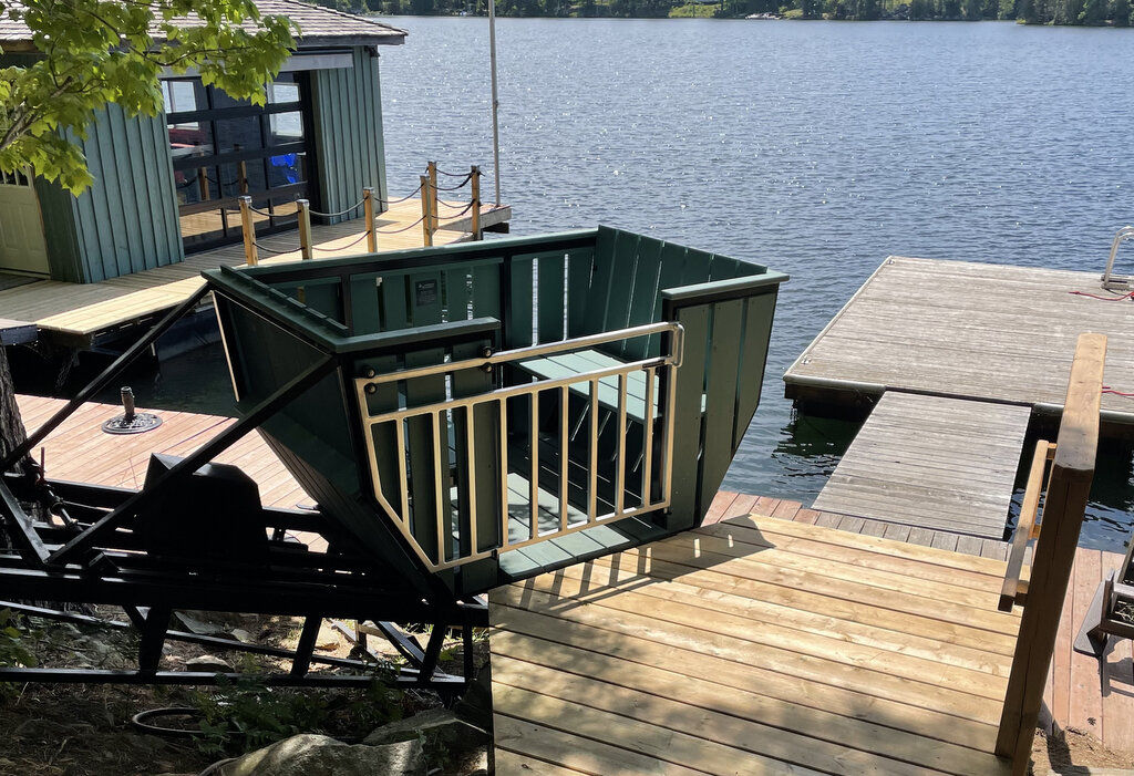 The new lower station sits five steps up from the dock. If those steps prove too much later, we can move the lower limit switches and bring the car closer to the dock.